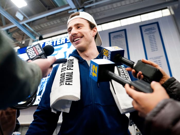 Saint Peter’s Doug Edert speaks to media in March